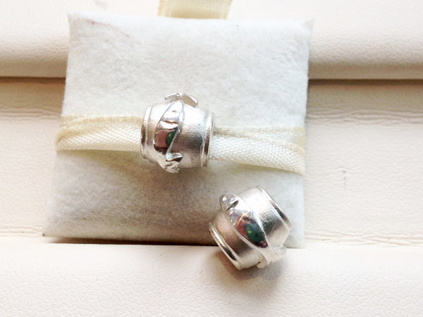 Rolling Capelin Charm